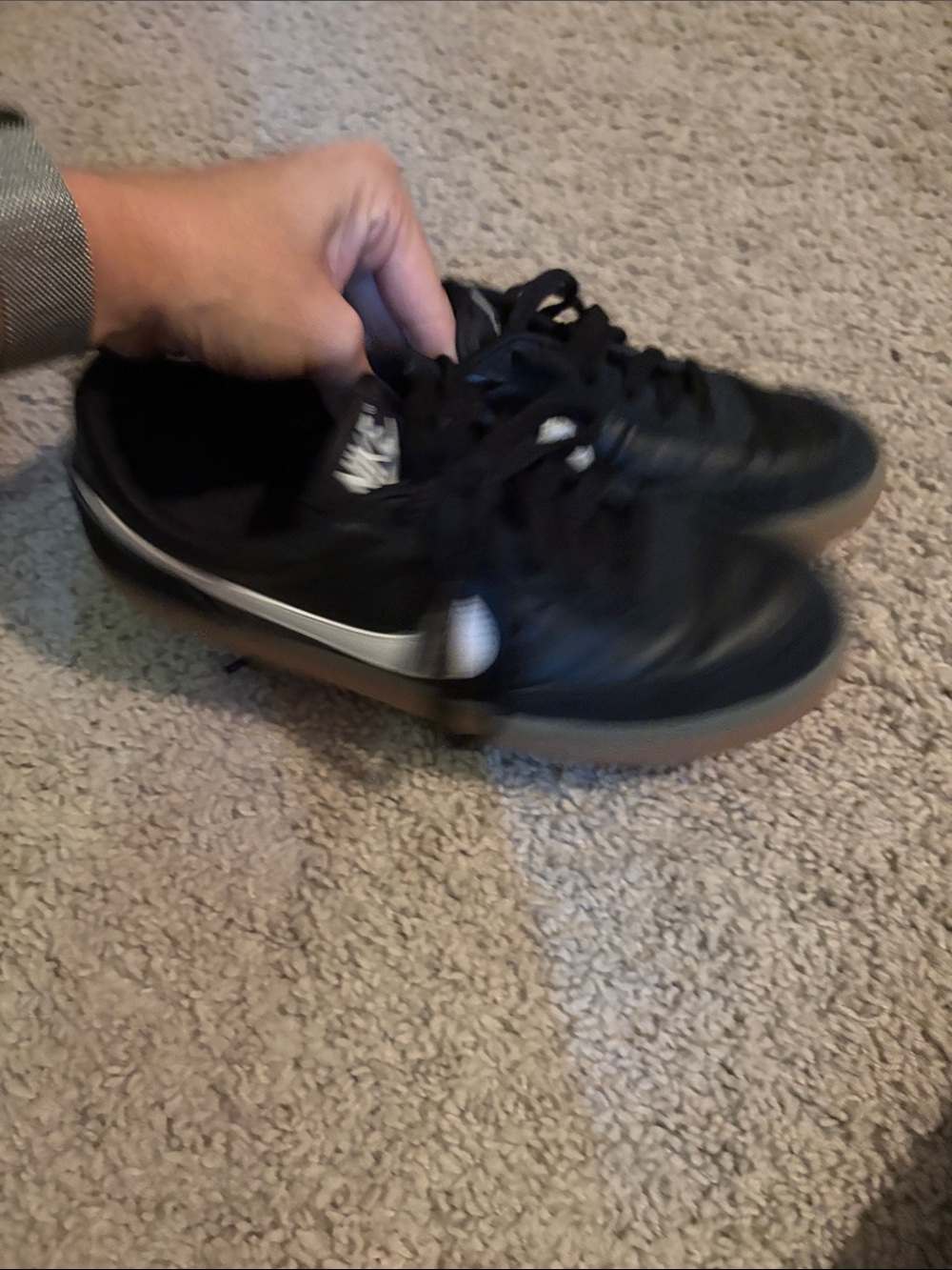 Nike Women’s Black Sneakers with White Swoosh and Gum Sole